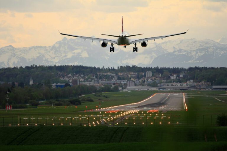 A picture with an airplane taking off.