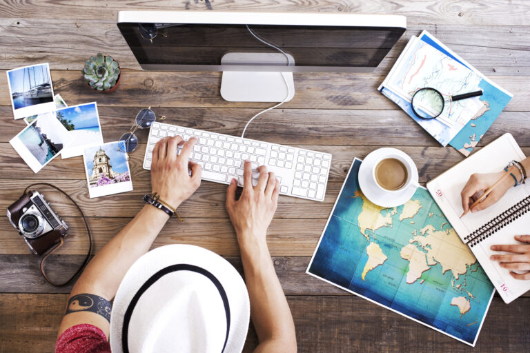 View from above of a person planning their next trip